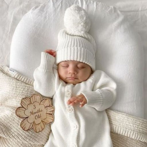 milestone discs and birth announcements.