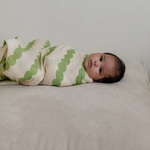 swaddles, wool wraps and blankets.